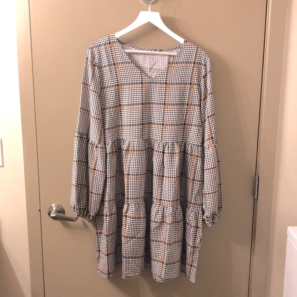 Plaid long sleeve baby doll style dress. Size Large